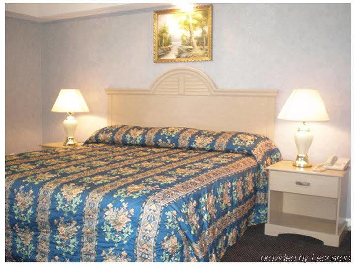 Village Inn & Suites - Smithville Room photo